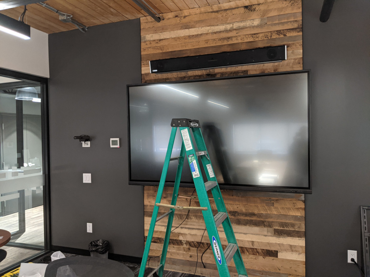 Boardroom TV Mounted with Ladder in front