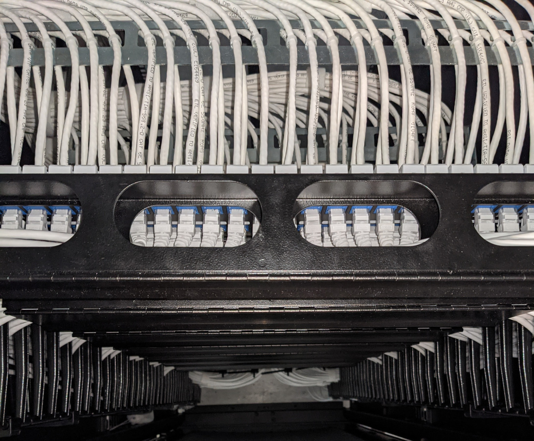 Rows of Punched-Down Cat6 Cables in a Server Cabinet